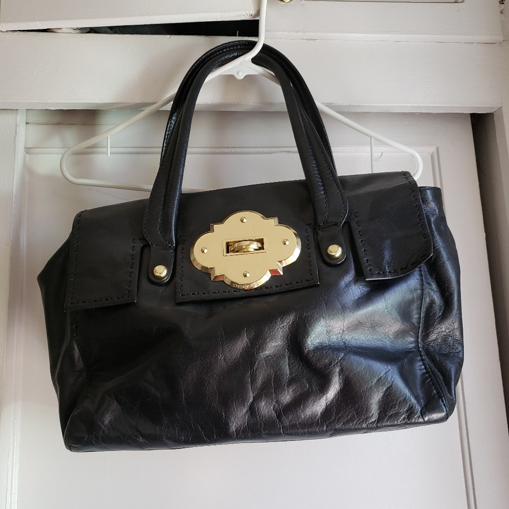 Beautiful black leather satchel. Gold accent hardw